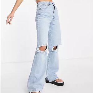 Stradivarius 90s dad jeans with rips in light wash